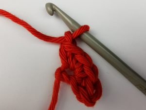 selbst gehäkeltes schmales Zackenband: 1. Reihe, Wendeluftmasche